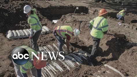 24 unmarked graves uncovered in probe of 1921 tulsa race massacre youtube