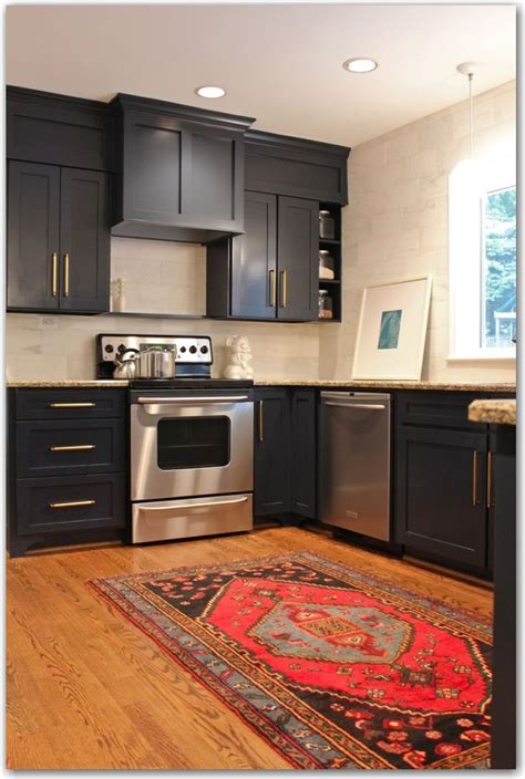 Professional kitchen cabinet painting costs $2.90 to $10.48 per square foot of paintable surface area or $30 to $60 per linear foot when measured the long way across the the chalk needs to be sealed. dark cabinets the painted house - Fieldstone Hill Design