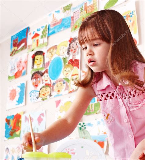 Child Paint Picture In Preschool Stock Photo By ©poznyakov 11833709