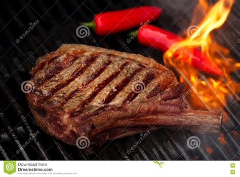 Food Meat Beef Steak On Bbq Barbecue Grill With Flame Stock Image