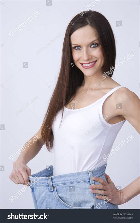 Brunette Woman Shows Weight Loss Jeans Stock Photo Shutterstock