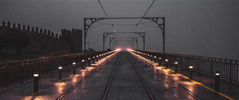 Download Wallpaper 2560x1080 Rails Railroad Lights Wet Backlight