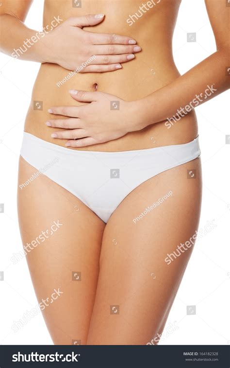 Topless Womans Touching Her Flate Belly Stock Photo