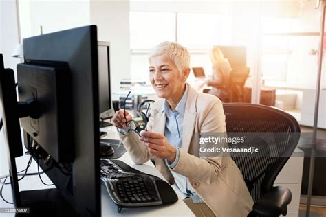 Mature Business Women Working At The Office High Res Stock Photo