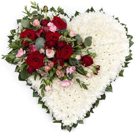 A funeral is a very solemn occasion, and you will therefore want to be able to rely on the florist you employ. Massed Heart | Funeral flowers, Funeral flower ...