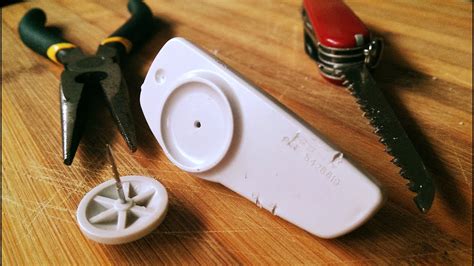I then put it back again (on an old piece of clothing, naturally) then i used the pointy ends. Simple how to: Remove a clothing security tag with common ...