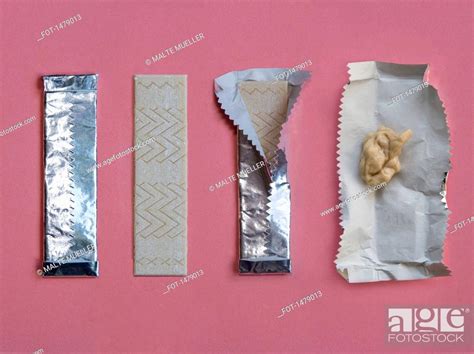 Progressive Stages Of Bubble Gum Being Chewed Against Pink Background