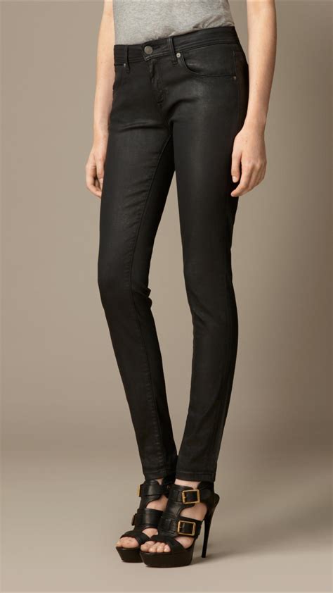 lyst burberry skinny fit low rise wax coated jeans in black