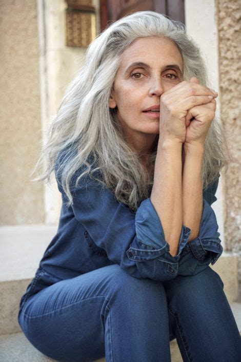 milva model woman old grey brown eyes denim blue dress long white hair silver grey hair