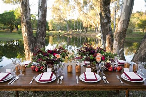 Marsala Floral Centerpieces On Wooden Table Photography Larissa