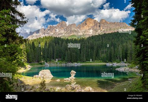 Carezza Lake Karersee And Coniferous Forest In Background The