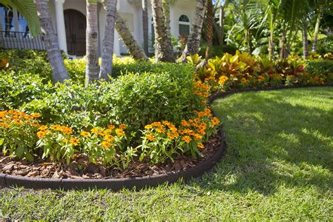 The flexible rubber edging will contour to any landscape and provide any project with a finished look. Earth conscious landscape edging made from RECYCLED RUBBER ...