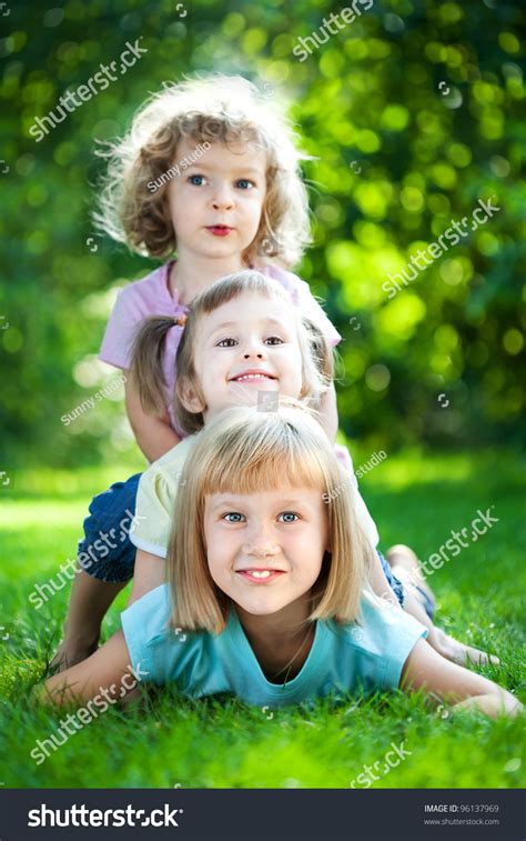 Group Happy Children Playing Outdoors Spring Foto Stock 96137969