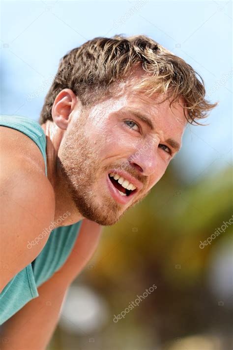 Tired Male Runner Catching Breath — Stock Photo © Maridav 72654695