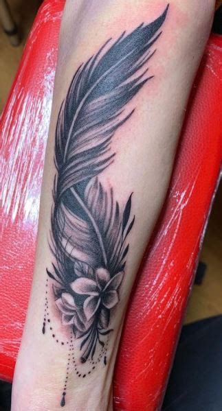 60 Feather Tattoos Meaning Ideas And Designs Tattoo Me Now
