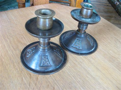 Antiques Atlas Pair Of Arts And Crafts Candlesticks