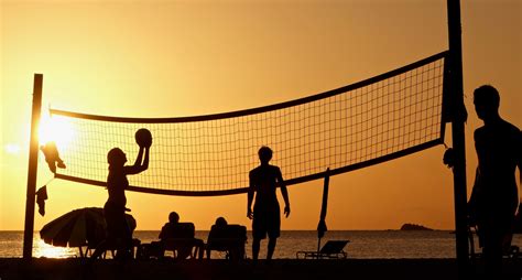 Beach volleyball uses a slightly smaller court than the indoor game (16m x 8m) and is divided in half by a net. Silhouette Photography Of People Playing Beach Volleyball ...