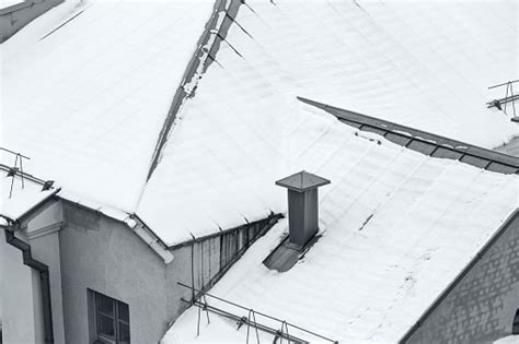 Snow On Metal Tiles Roofing In Winter Stock Photo Download Image Now