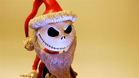 the nightmare before christmas art of jack skellington wearing santa