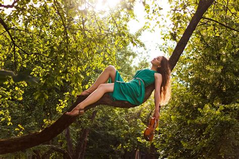 Hd Wallpaper Girl Sitting On Tree Branch During Daytime Woman Sitting