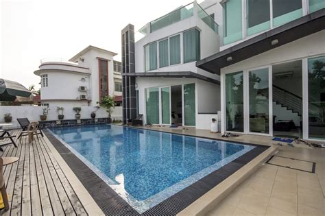 Door for access to your big backyard. Landed House Singapore - Types of Properties to Consider