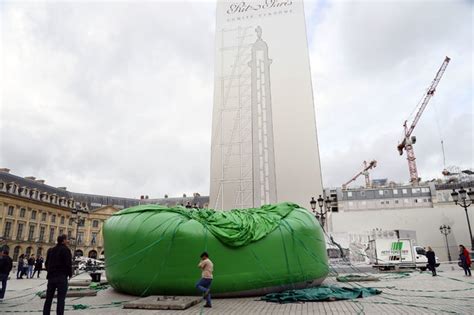 xxxmas redacted artist removes giant ‘sex toy christmas tree in paris — rt world news