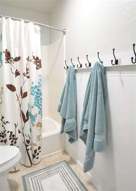 Towels are not just a bathroom necessity; I love these hooks for the kids bathroom instead of a ...