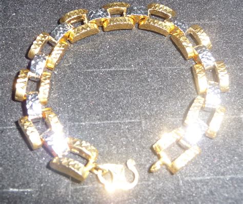 Barang kemas 916 rantai tangan dan pandora gambar dunia emas narshifa rantai tangan tulen 916 jenis bola ball di rebanas wing sing 916 gold hollow pandora bracelet / rantai tangan belut pandora emas 916 Gambar Emas Korea Sadur 24k Gelang Rantai Tangan Dewasa ...
