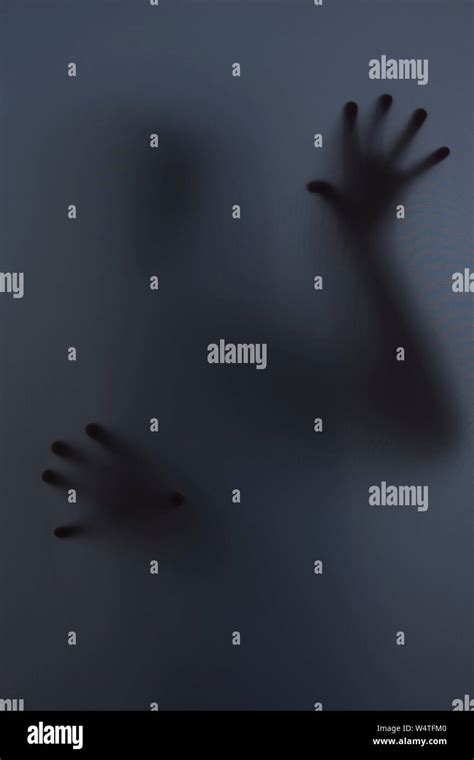 Shadowy Figure Behind Glass Fear Panic Concept Stock Photo Alamy