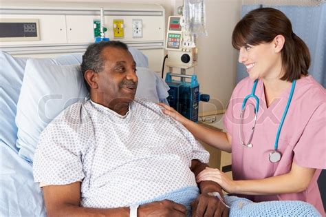 Nurse Talking To Senior Male Patient On Stock Image Colourbox
