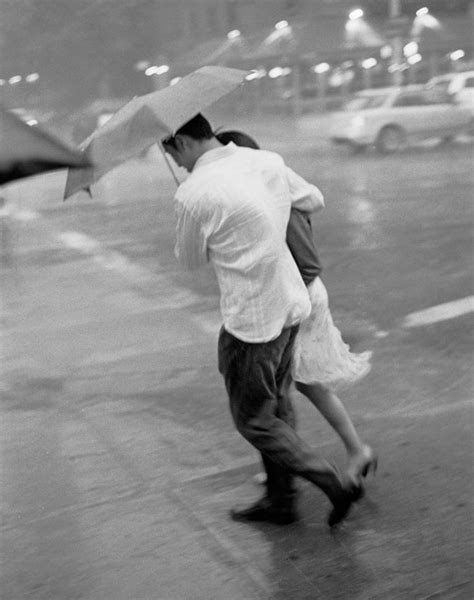 Couple In The Rain Photograph By Dave Beckerman