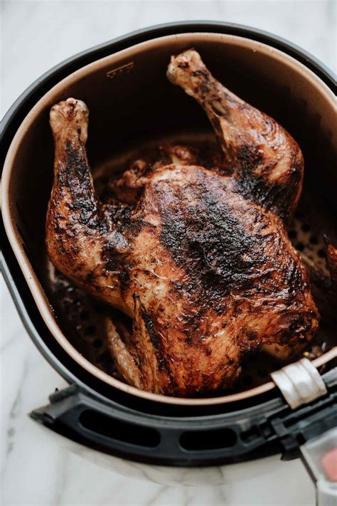 This recipe uses fresh rosemary but fresh thyme would work great as well. Air Fryer Whole Roasted Chicken | Amy in the Kitchen