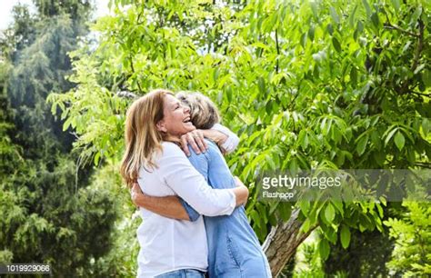 Mature Women Hugging Photos And Premium High Res Pictures Getty Images