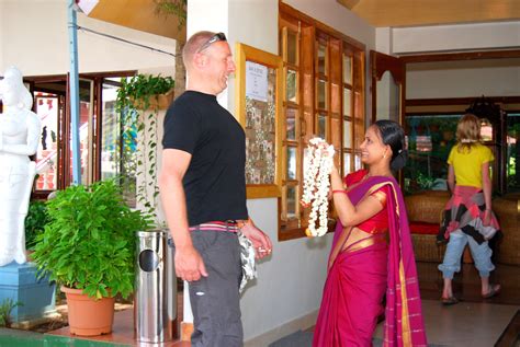 our-staff-greeting-our-guest-in-a-typical-indian-tradition-fresh-garlands,-traditional,-indian