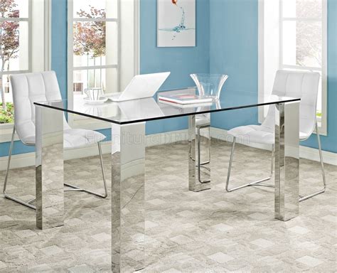 Easily paired with a variety of different chair styles. Staunch Dining Table Glass Top & Stainless Steel Legs by ...