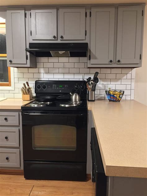 Replaced the cabinet doors and hardware. How To Update a 1970s Kitchen On a Budget - The Granvillian | 1970s kitchen remodel, Redo ...
