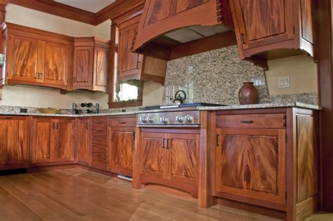 The red cherry mahogany finish enhanced the cabinets and brought a tremendous amount of sheen and luster back to this kitchen. Mahogany kitchen - Eclectic - Kitchen - Huntington - by ...
