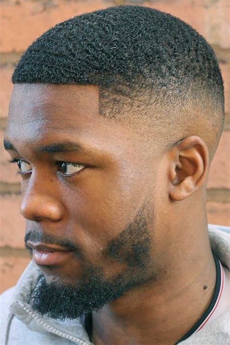 Faded sides with shaved line. Creative And Stylish Ideas For Black Men Haircuts 2020 | MensHaircuts