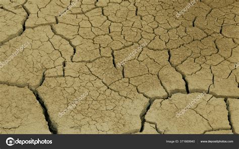 Very Drought Wetland Swamp And Pond Drying Up The Soil Cracked Crust