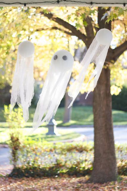 Diy Hanging Cheesecloth Ghosts For Inexpensive Halloween Decor Ghost