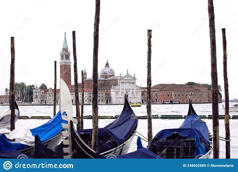 Romantic View On Architecture Of Venice With Gondolas Floating On The