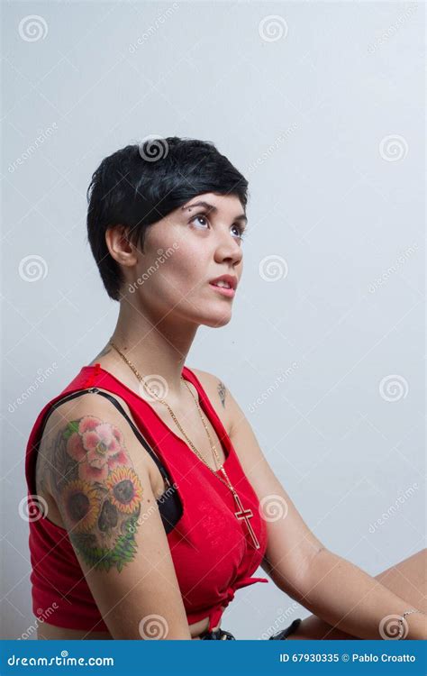 Profile Of A Short Hair Brunette Woman Looking Up Wearing A Red Stock Image Image Of Girl