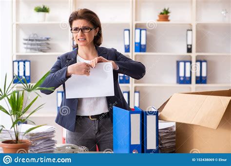 middle aged female employee being fired from her work stock image image of firing