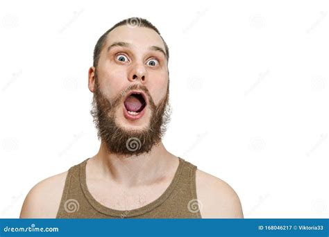 Very Surprised Scared Funny Face Of A Bearded Guy With Open Mouth And
