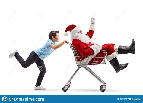 Boy Pushing Santa Claus In A Shopping Cart Stock Image Image Of