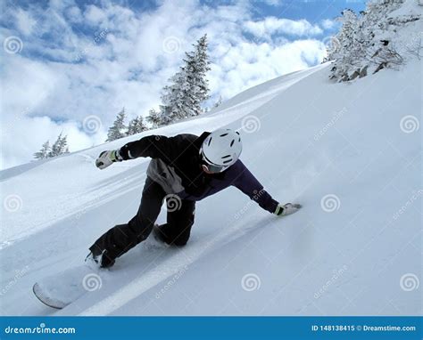 Mountain With Clouds And Snow Snowboarder In Full Speed Stock Image