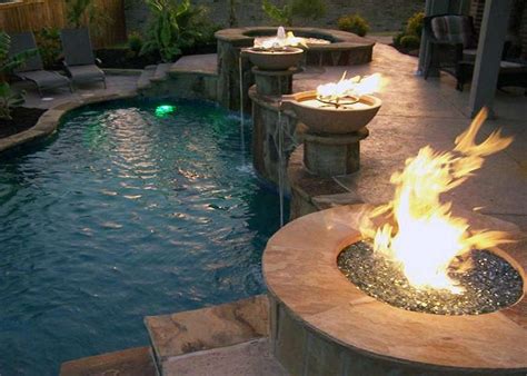 Check out our guide to these fabulous dramatic fire and water features can transform your pool from fun to fabulous, creating a centerpiece swimming pool water features ideas. Custom Stone Work and Fire Pits Texas Pool Finders ...