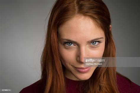 Portrait Of Smiling Redhead Woman Staring At Camera Photo Getty Images