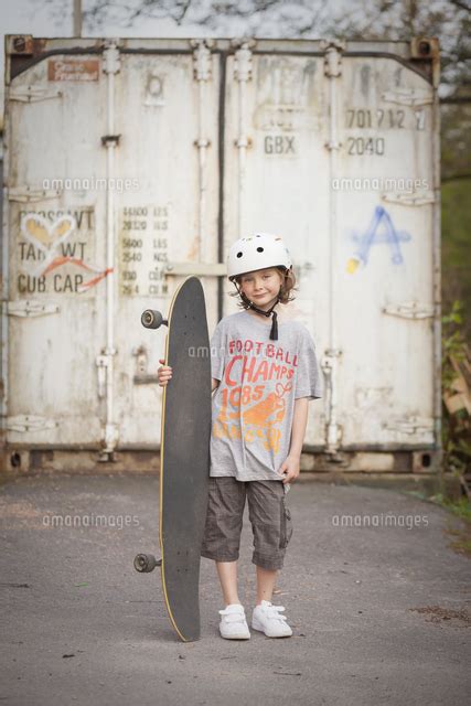 Sweden Vastergotland Lerum Portrait Of Boy 8 9 With Skateboard In