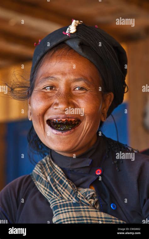 A Ann Tribal Woman In Traditional Dress In Her Village Near Kengtung